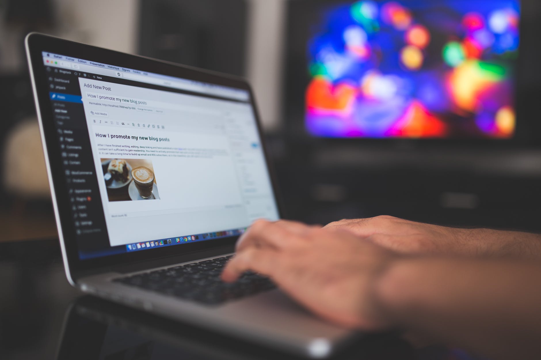 a man works at a laptop